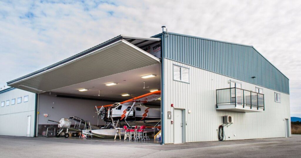 The Width of a Large Aircraft Hangar Bay Door that is 100 Feet Long